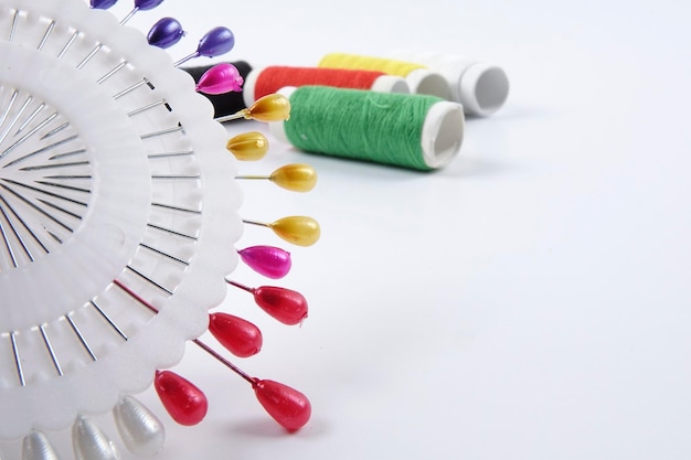 colorful threads and needle